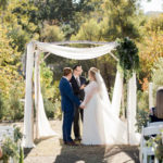 Birch chuppah with soft fabric for wedding ceremoyny in Los Angeles. Chuppah rental from Blue Fish Event Rentals